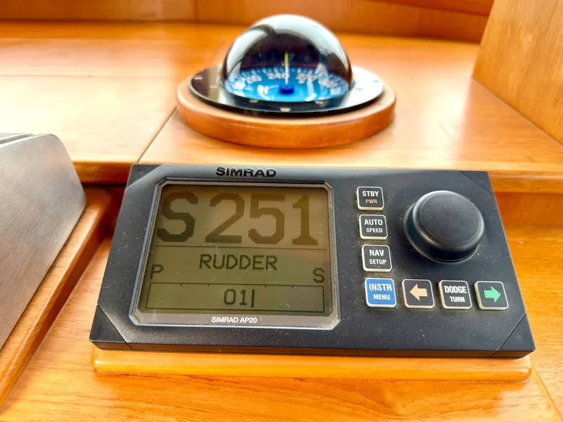 Slide: The Image of Grand Banks Classic 2003 helm with Simrad AP20 autopilot display. - 33