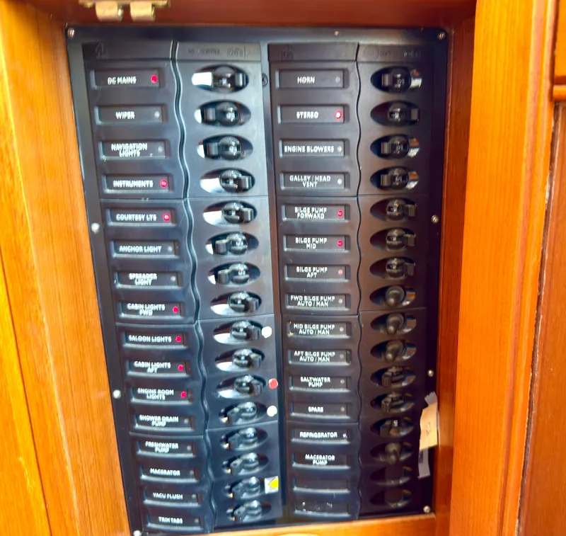 Slide: The Image of Control panel of a 2003 Grand Banks Classic boat. - 40