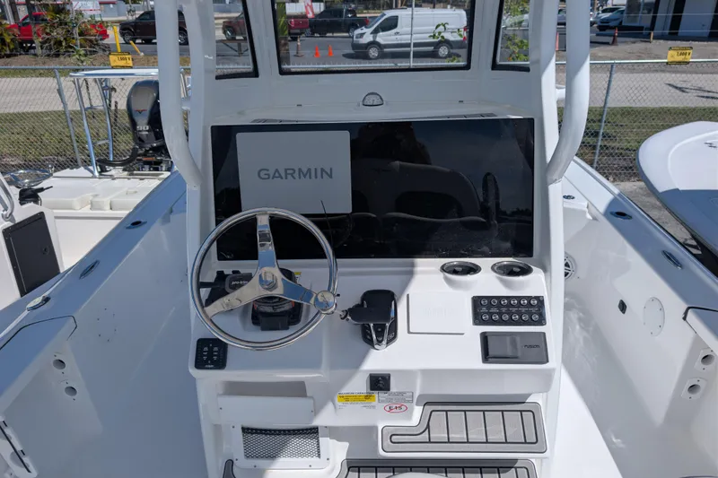 Slide: The Image of 2026 Tidewater 2410 Bay Max boat console with Garmin navigation system. - 6