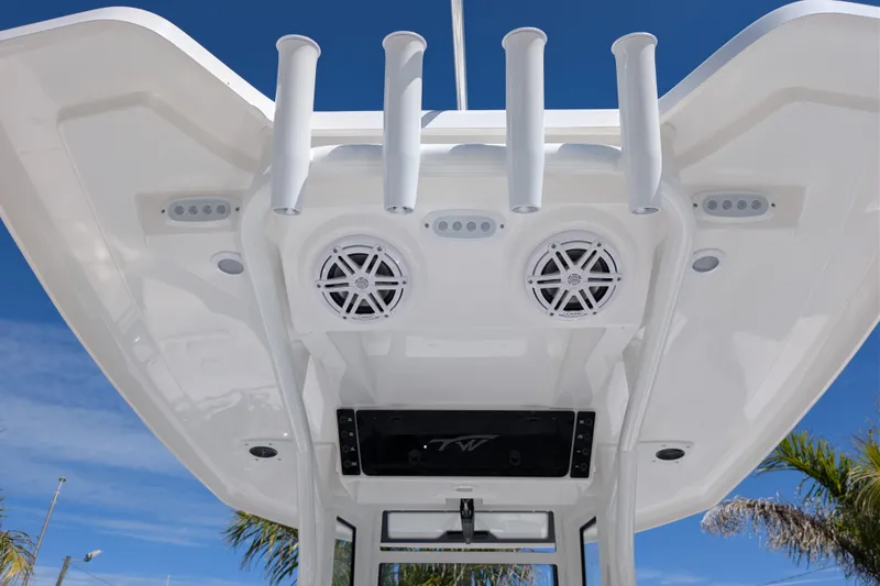 Slide: The Image of Tidewater 2410 Bay Max 2026 boat top view with speakers and rod holders. - 7