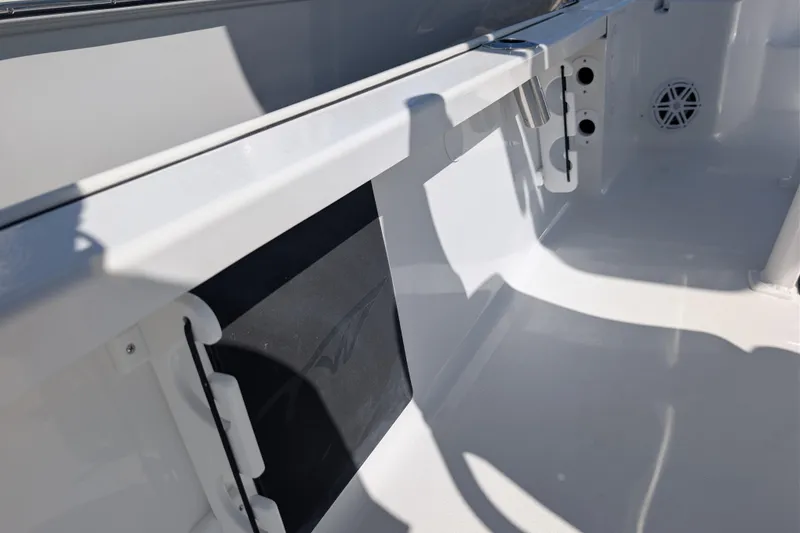 Slide: The Image of Interior view of 2026 Tidewater 2110 Bay Max boat, showcasing sleek design and storage features. - 10