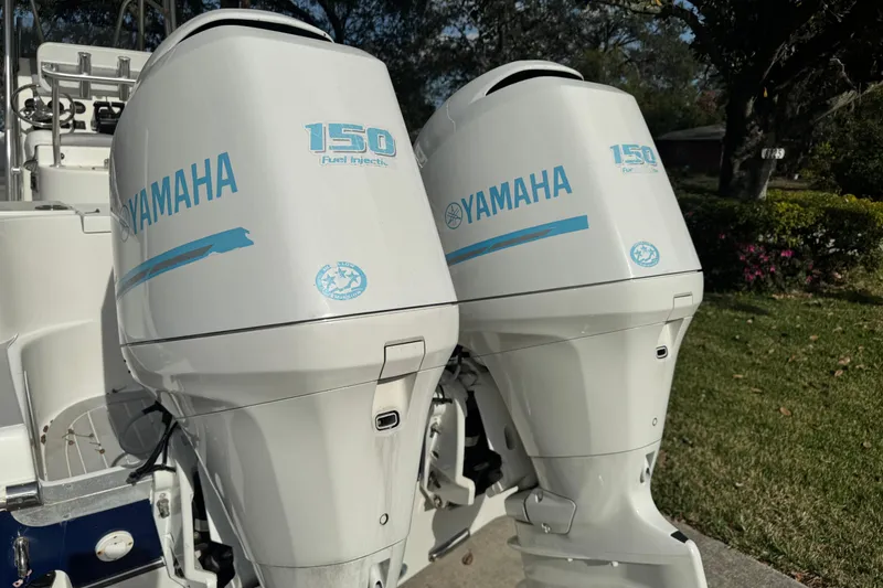 Slide: The Image of Twin Yamaha 150 outboard engines on a 2012 NauticStar 2500XS Offshore boat. - 7