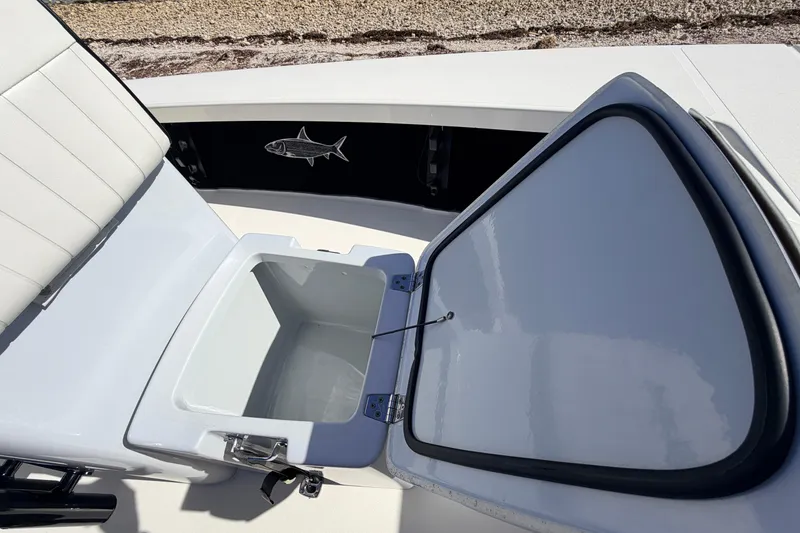 Slide: The Image of 2021 Maverick 18 HPX-V boat with open storage compartment and fish decal. - 26