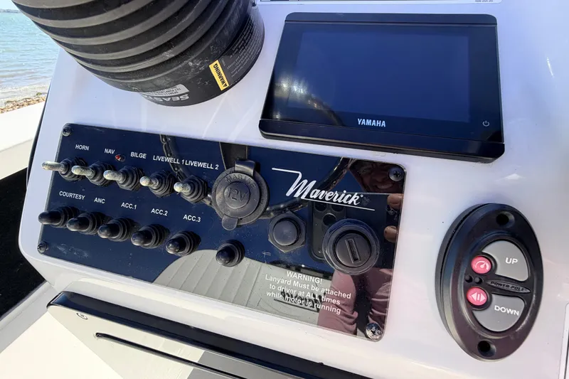 Slide: The Image of Control panel of 2021 Maverick 18 HPX-V boat with Yamaha display and switches. - 32