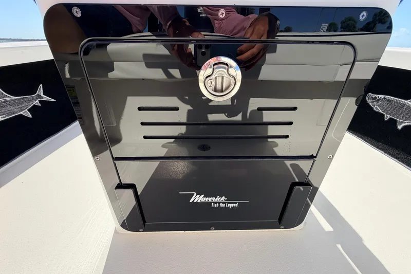 Slide: The Image of 2021 Maverick 18 HPX-V boat console with sleek black finish and fish graphics. - 33