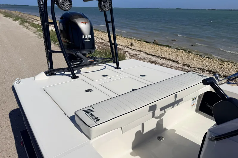 Slide: The Image of 2021 Maverick 18 HPX-V boat with Yamaha 115 engine by the shoreline. - 42