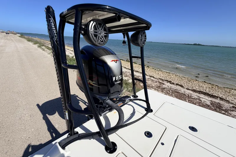 Slide: The Image of 2021 Maverick 18 HPX-V boat with Yamaha 115 engine by the shoreline. - 55