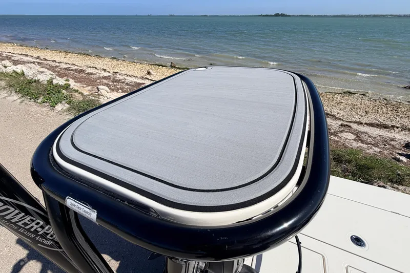 Slide: The Image of 2021 Maverick 18 HPX-V boat deck by the shoreline, showcasing sleek design and craftsmanship. - 57