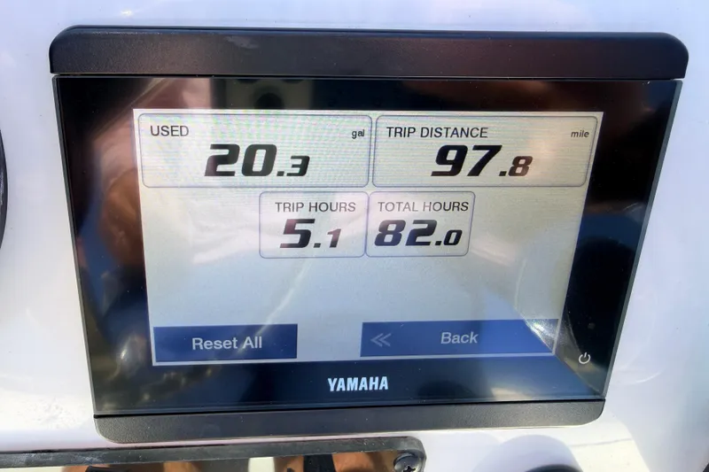 Slide: The Image of Yamaha display showing fuel usage, trip distance, and hours for 2021 Maverick 18 HPX-V. - 58