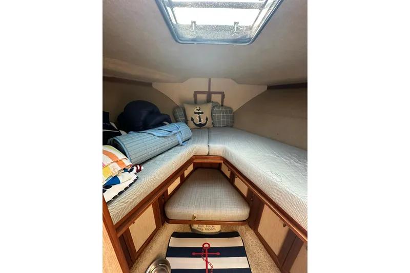 Slide: The Image of Cozy cabin interior of 1985 Carver 3207 Aft Cabin Motor Yacht with nautical decor. - 14