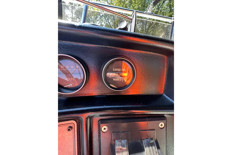 Slide: The Image of Dashboard of 1985 Carver 3207 Aft Cabin Motor Yacht showing gauges and controls. - 36