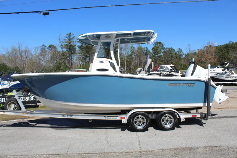 The Image of 2021 Sea Pro 239 DLX Center Console on trailer, side view. - 1