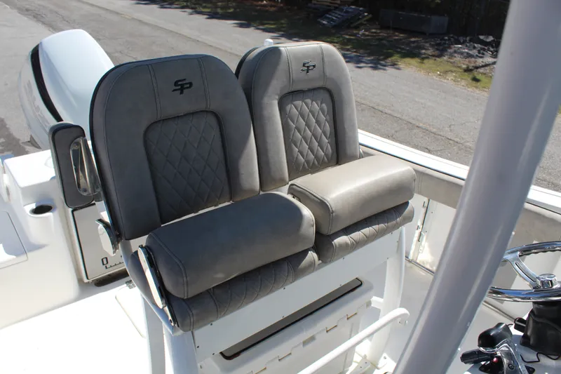 Slide: The Image of 2021 Sea Pro 239 DLX Center Console seats with gray upholstery. - 10