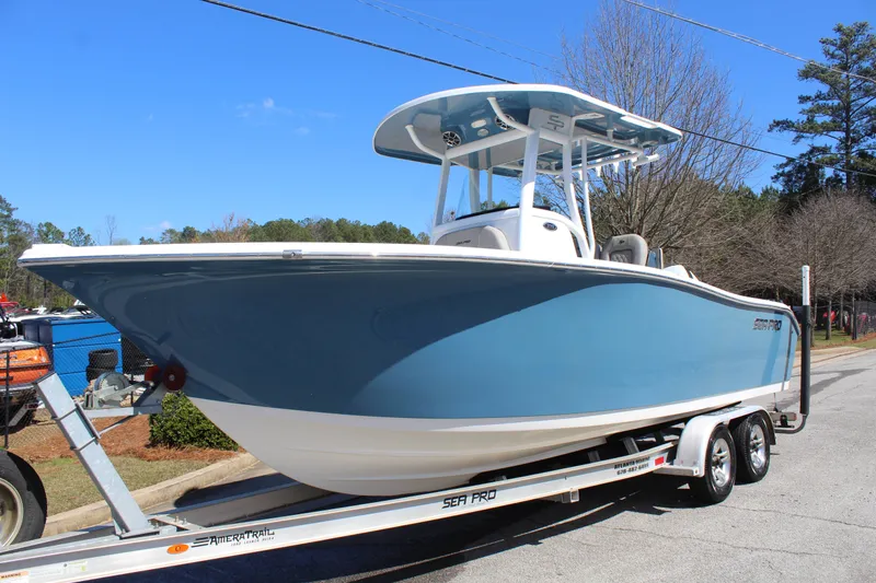 Slide: The Image of 2021 Sea Pro 239 DLX Center Console on trailer. - 2