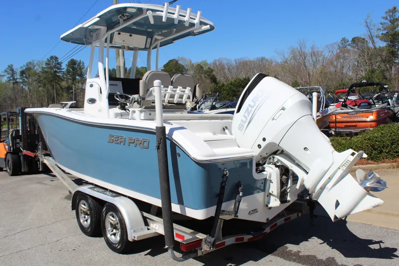 Slide: The Image of 2021 Sea Pro 239 DLX Center Console boat on trailer. - 3