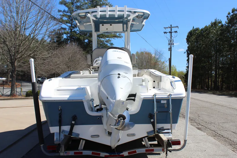 Slide: The Image of Rear view of a 2021 Sea Pro 239 DLX Center Console boat. - 5