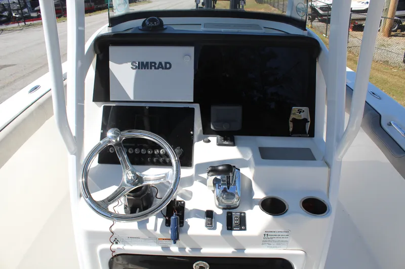 Slide: The Image of Control console of the 2021 Sea Pro 239 DLX Center Console boat. - 9