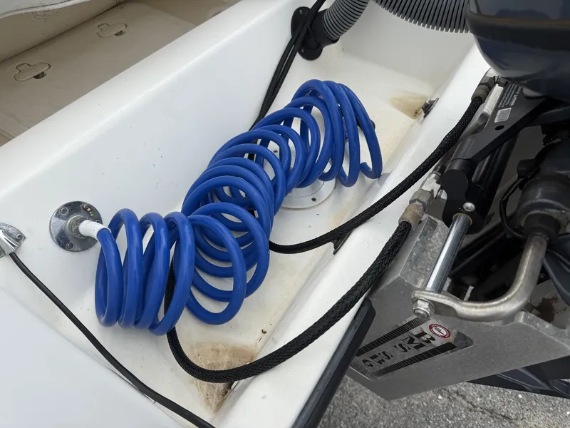 Slide: The Image of Blue hose in a 2007 Century 1701 boat. - 4
