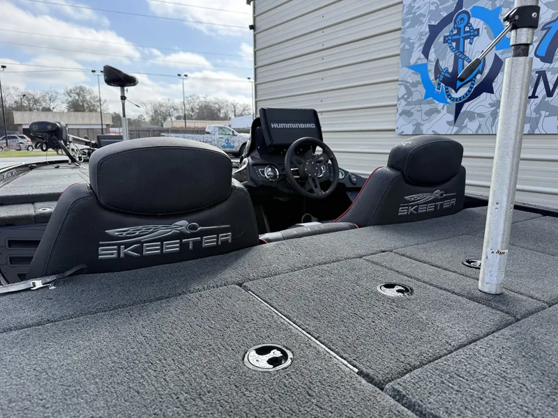 Slide: The Image of 2020 Skeeter ZX225 boat interior with steering console. - 15