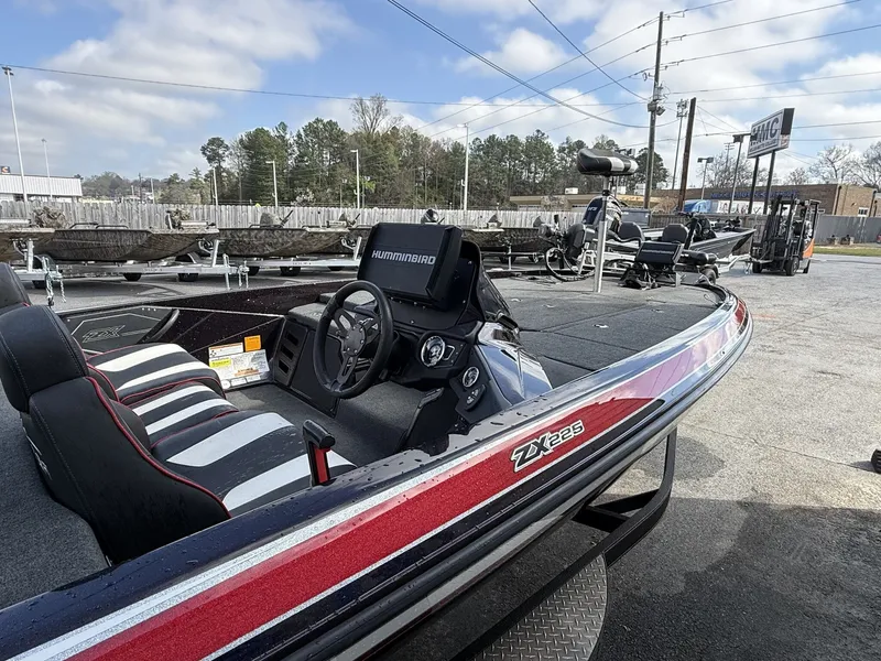 Slide: The Image of 2020 Skeeter ZX225 boat with modern features and steering console. - 16