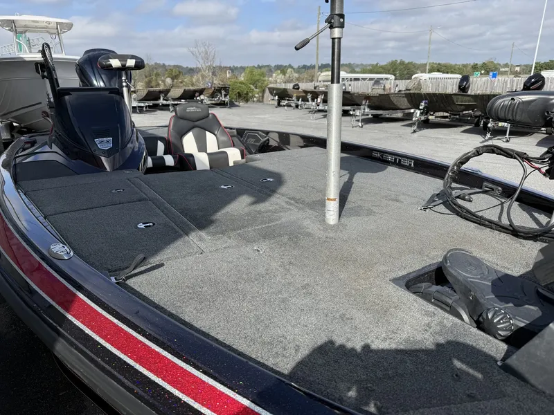 Slide: The Image of 2020 Skeeter ZX225 boat with spacious deck and seating area. - 3