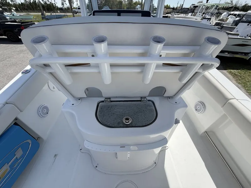 Slide: The Image of 2021 Sea Hunt Gamefish 25 boat with rod holders and storage. - 16