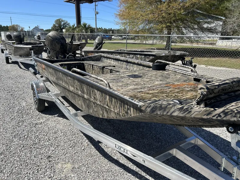 Slide: The Image of Excel 1751 Viper F4 boat from 2026 on trailer, parked outdoors. - 3