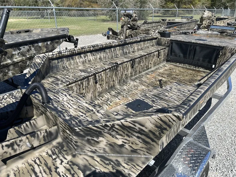 Slide: The Image of Excel 1751 Viper F4 boat 2026 with camouflage pattern on trailer. - 4