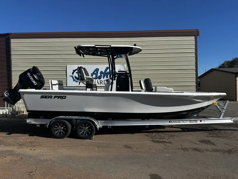 The Image of 2026 Sea Pro 250 Bay boat on trailer, Suzuki engine. - 1