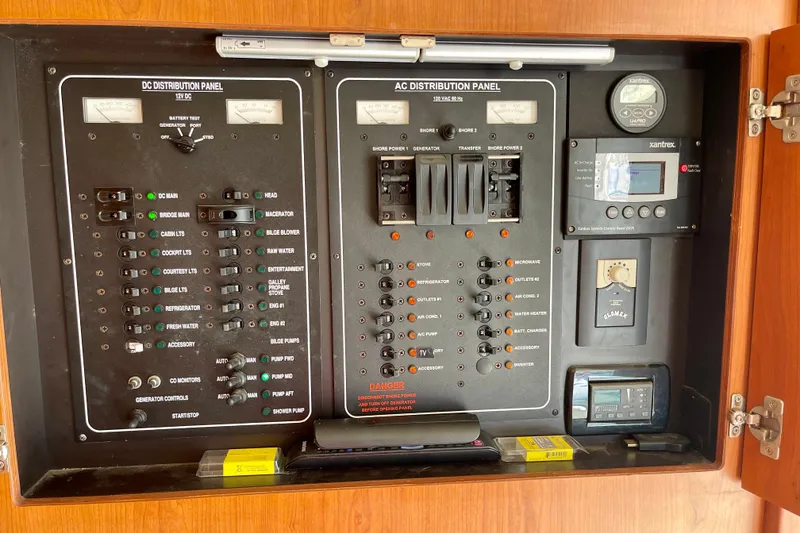 Slide: The Image of Electrical control panel of a 2008 Mainship 34 Trawler boat. - 56
