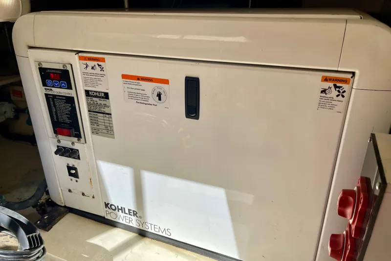 Slide: The Image of Kohler power system in 2008 Mainship 34 Trawler engine room. - 61