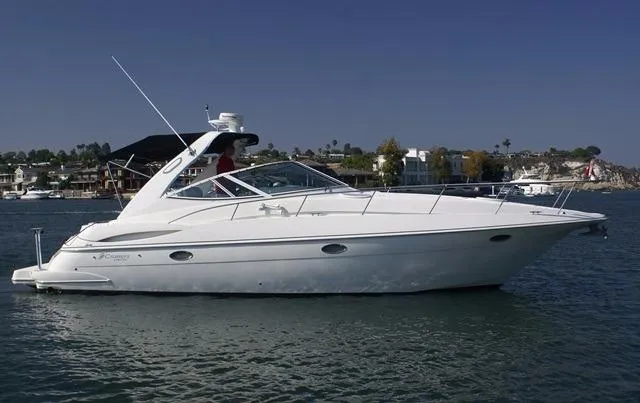 Slide: The Image of 2005 Cruisers Yachts 340 Express on calm water. - 5