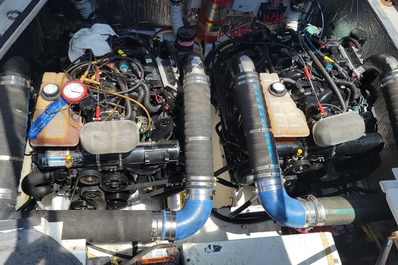Slide: The Image of Twin engines in a 2005 Cruisers Yachts 340 Express boat engine compartment. - 7