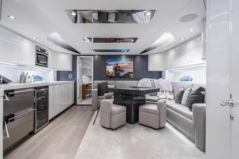 Slide: The Image of Luxurious interior of 2021 Sunseeker Predator 68 yacht with modern kitchen and elegant seating area. - 10