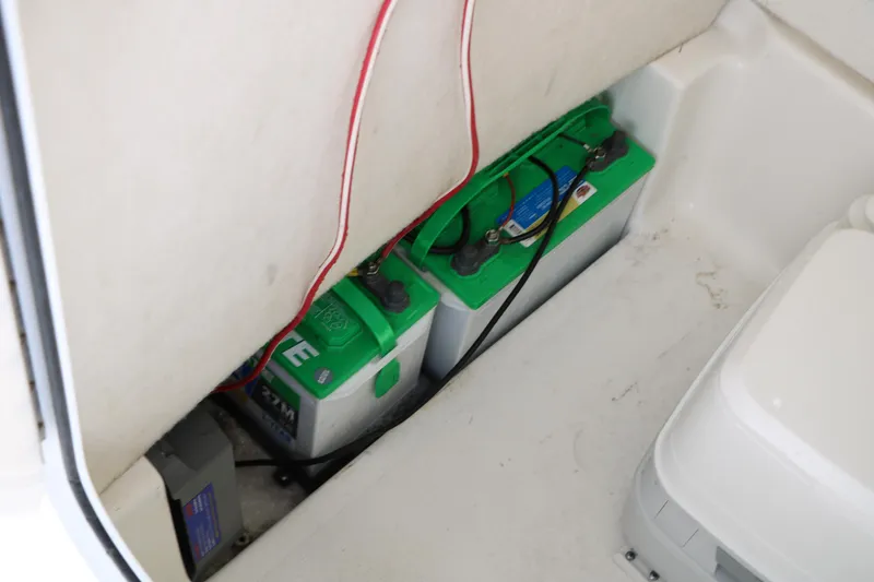 Slide: The Image of Battery compartment of 2016 Sea Hunt BX 22 BR boat with wiring. - 29