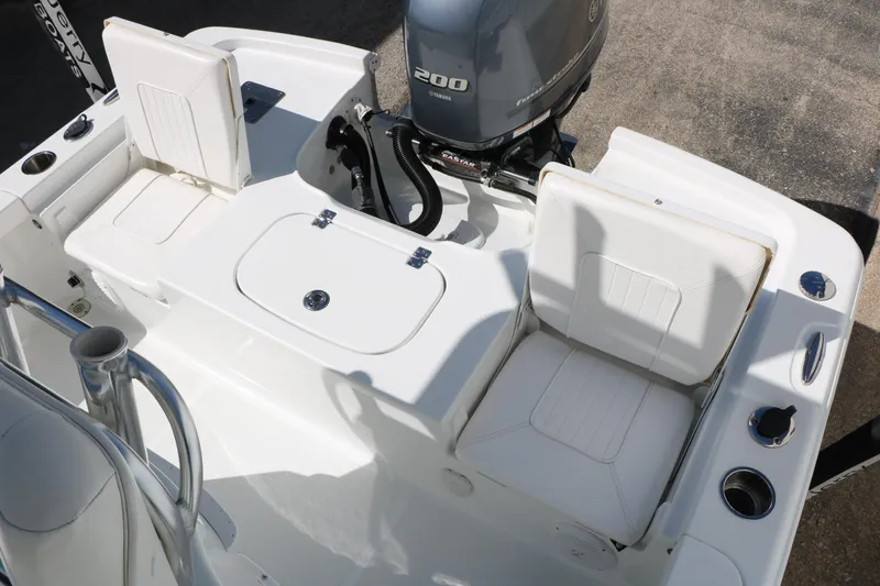 Slide: The Image of 2016 Sea Hunt BX 22 BR boat interior with Yamaha 200 engine. - 42