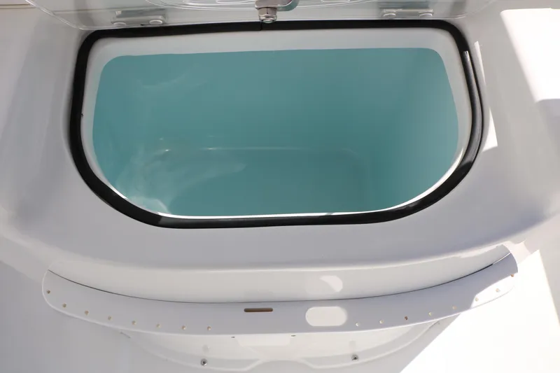 Slide: The Image of Open livewell on 2016 Sea Hunt BX 22 BR boat, showcasing interior design. - 44