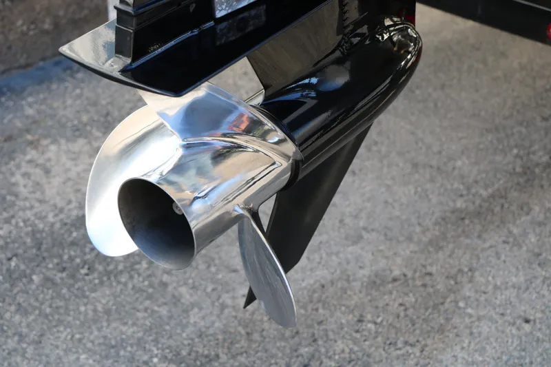 Slide: The Image of Close-up of a 2024 Sun Chaser Geneva SB DH boat propeller on pavement. - 10