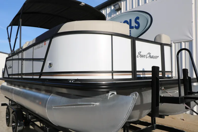 Slide: The Image of 2024 Sun Chaser Geneva SB DH pontoon boat on trailer, side view. - 15