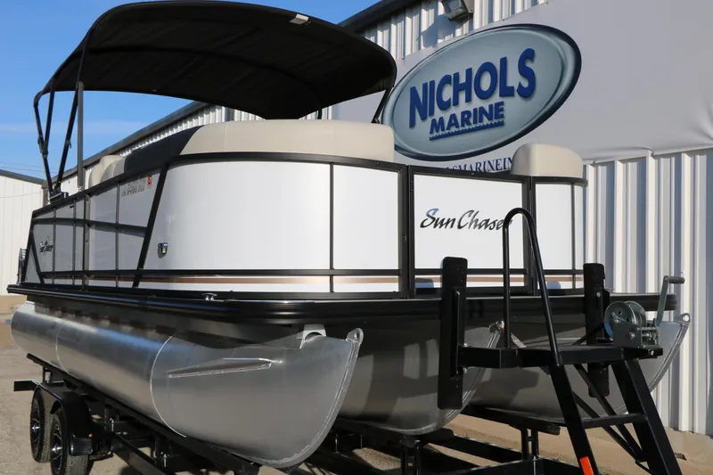 Slide: The Image of 2024 Sun Chaser Geneva SB DH pontoon boat at Nichols Marine dealership. - 3