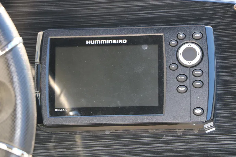Slide: The Image of Humminbird Helix 5 fish finder on 2024 Sun Chaser Geneva SB DH dashboard. - 31