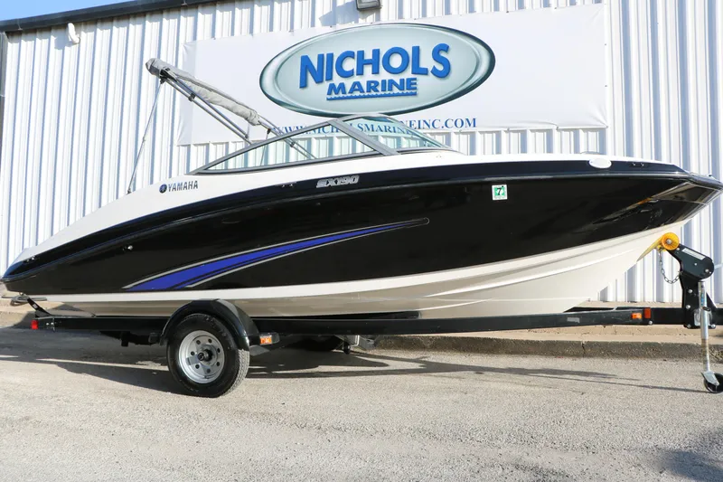The Image of 2014 Yamaha Boats SX190 on trailer at Nichols Marine dealership. - 1