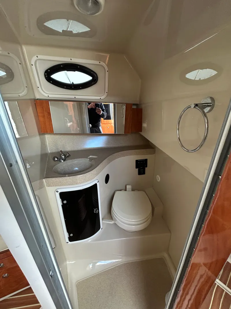 Slide: The Image of Interior view of 2015 Wellcraft 290 Coastal bathroom. - 14