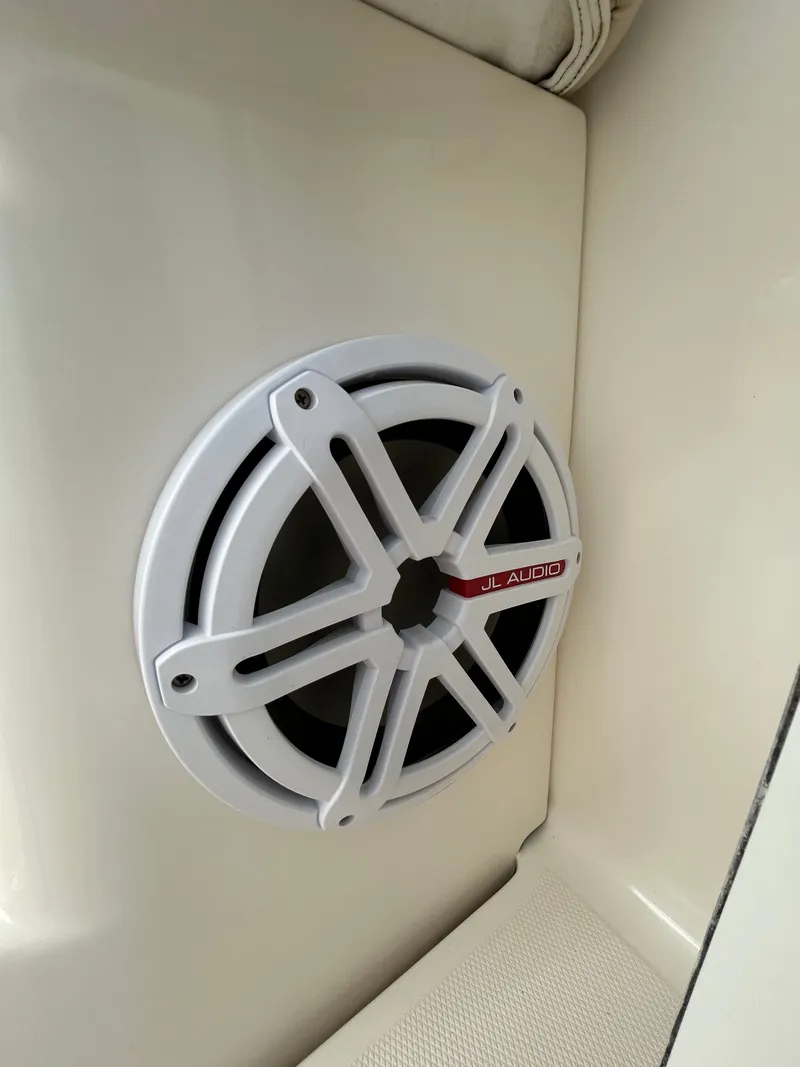 Slide: The Image of JL Audio speaker on Wellcraft 290 Coastal 2015 boat. - 17