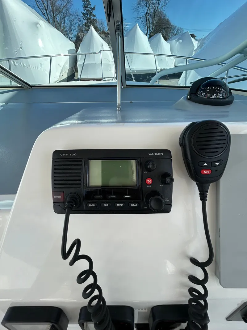 Slide: The Image of 2015 Wellcraft 290 Coastal boat console with Garmin VHF 100 radio. - 20