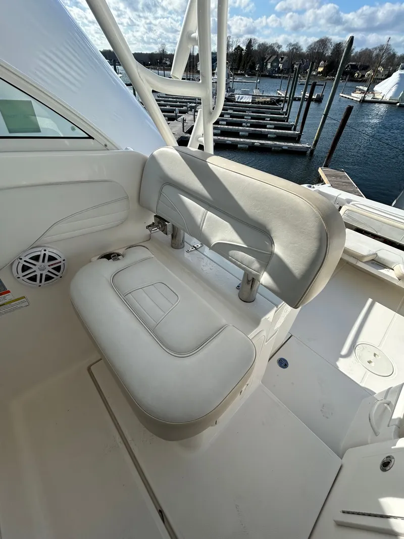 Slide: The Image of Interior of a 2015 Wellcraft 290 Coastal with white seating. - 22