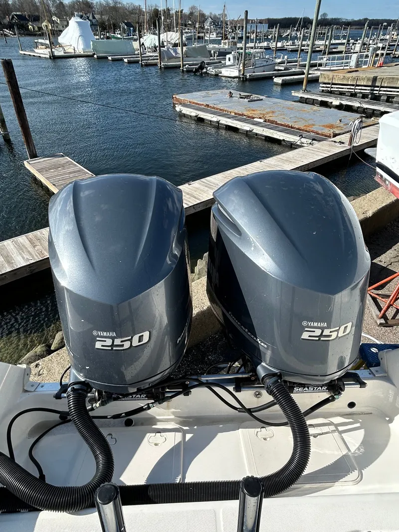 Slide: The Image of 2015 Wellcraft 290 Coastal with Yamaha 250 engines at the dock. - 23