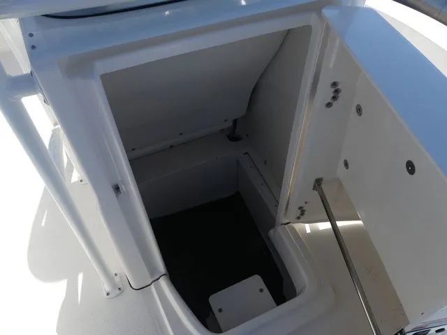 Slide: The Image of Storage compartment in 2026 Robalo R180 Center Console boat. - 14