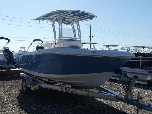 Slide: The Image of 2026 Robalo R180 Center Console boat on trailer. - 3