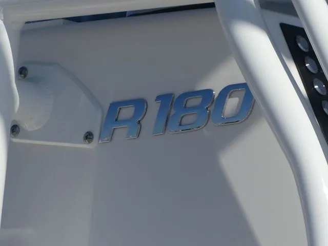 Slide: The Image of Close-up of Robalo R180 Center Console emblem, 2026 model. - 8